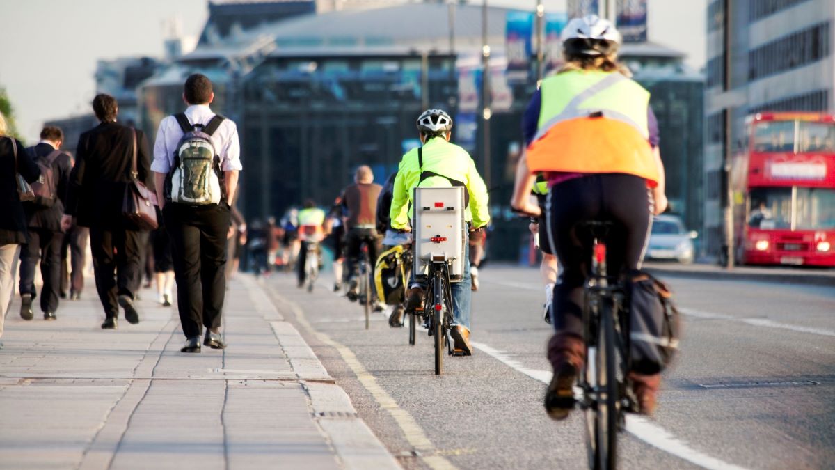 cyclists and pedestrians on street